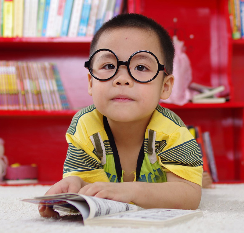 young boy with glasses