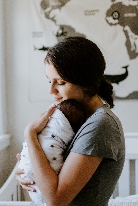 Mother holding child