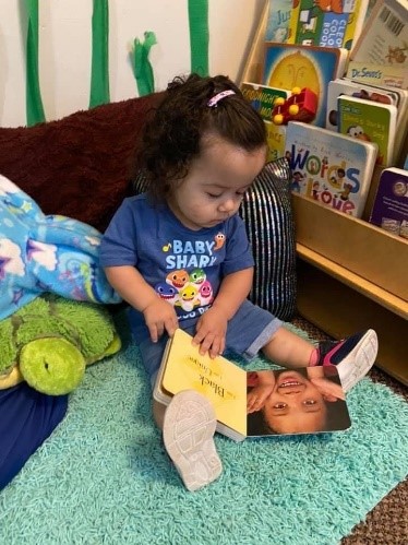 Child with book